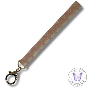 Handmade Gold Keychain with a Cream and Pink Floral Fabric